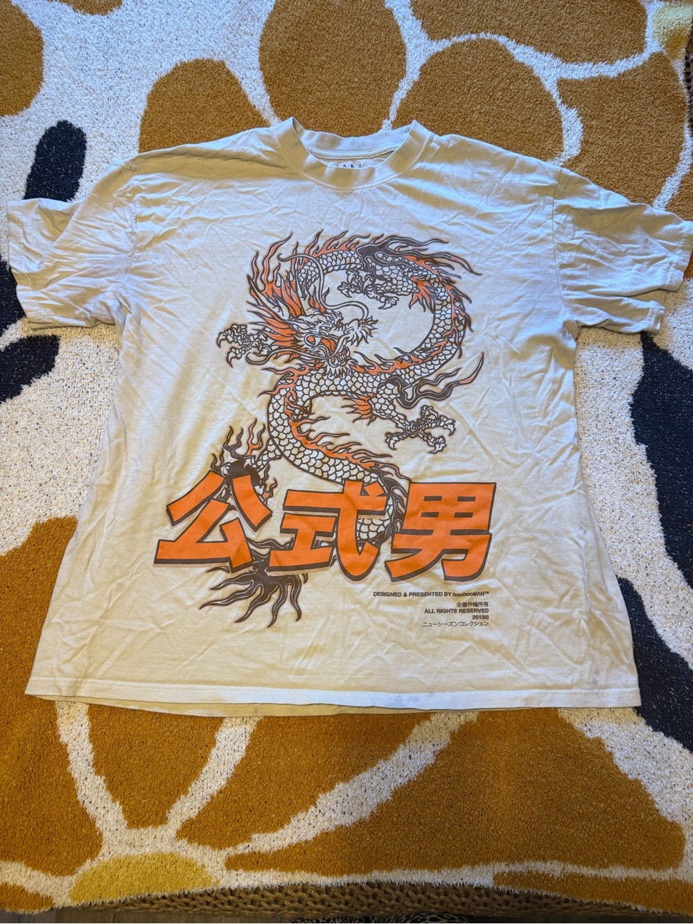 White Short-Sleeve Tee with Orange Dragon Graphic